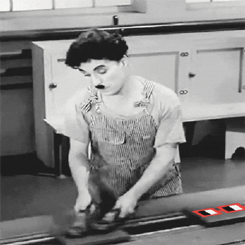 Meme: Charlie Chaplin updating old tech into color tech