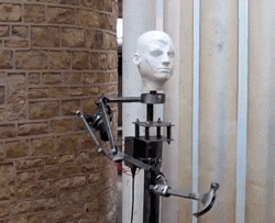 Meme: Poorly built robot unable to use a hammer