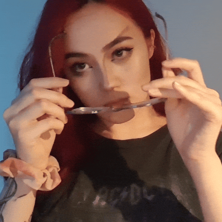 Meme: Putting on eyeglasses to see better